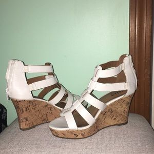 white and tan open toed platforms